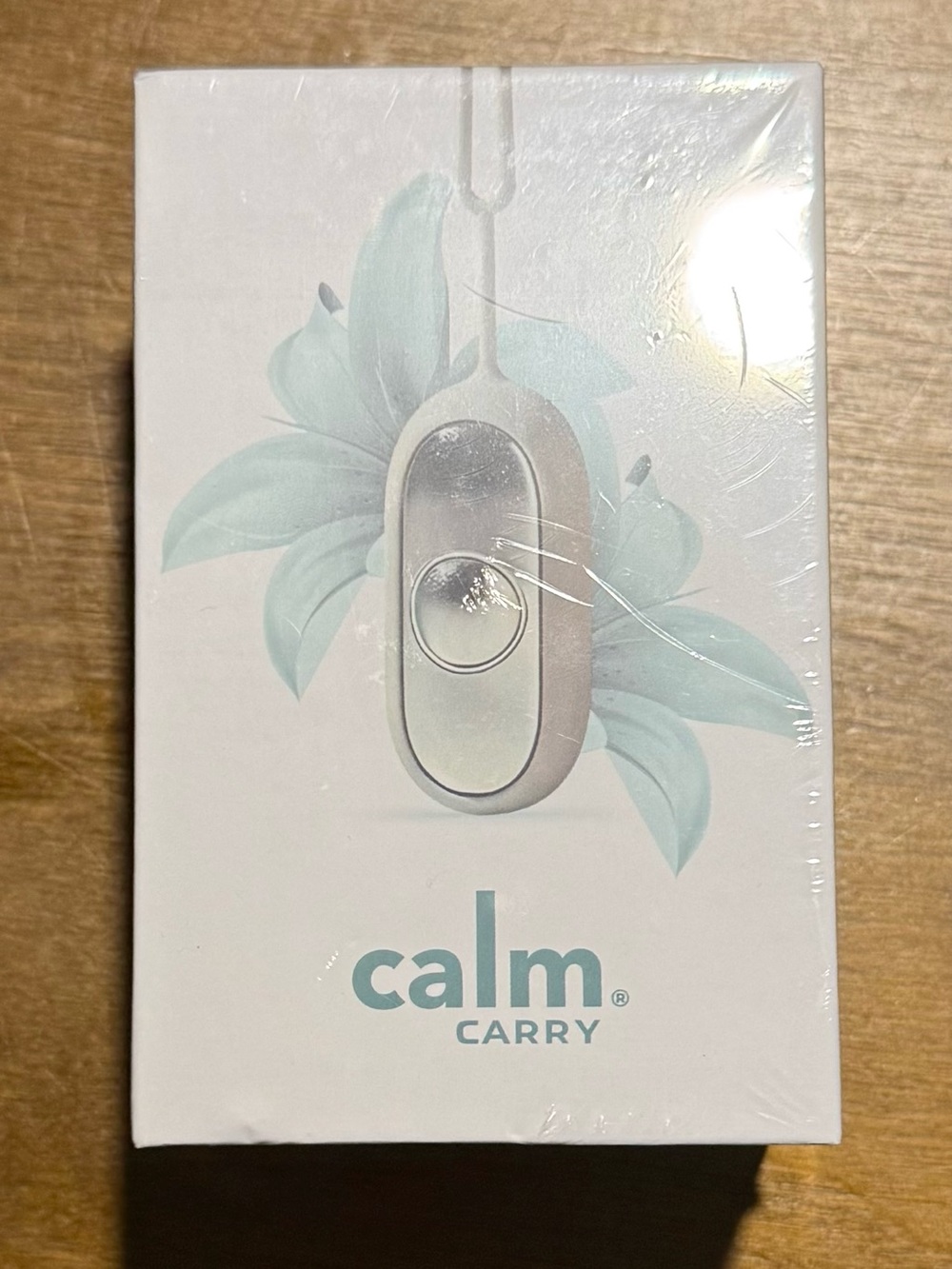 "Calm Carry" Glow Company anti-anxiety/insomnia/stress relief device. Teal. NIB.